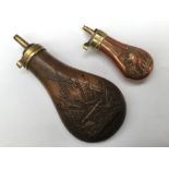 Two Copper powder flasks. One for a pistol and one for a Musket. (2)