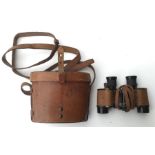 WW2 US Army Signal Corps Binoculars by Busch & Lomb. Serial number EE290484. Complete with leather
