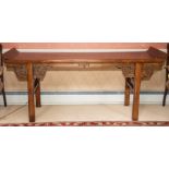 A Chinese altar table, late Qing Dynasty/Republic, the rectangular top with scroll ends above a