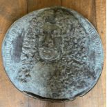 A 19th century metal commemorative roundel depicting Frederick William.