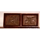 A late 19th Century cast bronze wall plaque in a oak frame of gaming scene of a stag in the