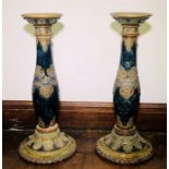 A pair of 20th century Royal Dolton jardiniere stands (2)