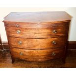 A George III mahogany bow front bachelors chest of drawers, circa 1820, moulded edge top above a