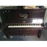 A Steck Pianola upright piano, having seven and a quarter octaves, Ivory keys, with damper and