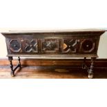 A James I Jacobean period oak dresser base, circa 1620, rectangular moulded edge top, above three