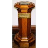A Victorian revival oak letterbox, octagonal shape with a lacquered inlay of marble colours, moulded