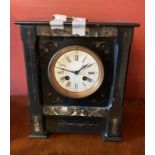 An early 20th Century ebonised marble mantel clock, 8-day movement striking to a bell with roman