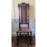 A 19th Century walnut Carolean style chair, carved floral top with cane work inlay splat, moulded