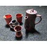 A group of six 20th century glazed Art Pottery items including, pot, jug, and beakers (6)
