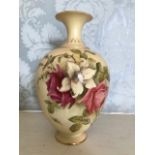 A Royal Worcester blue ivory bottle vase, florally decorated, Shape No.392B, date cypher for circa