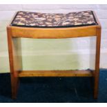 An Art Deco walnut dressing stool with floral design fabric top. 43 cm tall. (1) Condition: In