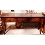 A George III design oak hall table, rectangular top fitted with three frieze drawers, raised on