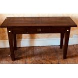 A 20th Century solid oak hall table, fitted with a single drawer, square tapered legs. 79cm H x