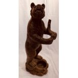 A Black Forest carved wooden Bear stick/umbrella stand, in form of a standing Bear holding a