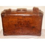 A Late 19th Century brown leather travel suitcase trunk by F. Best of London (stamped inside and