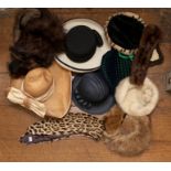 A Collection of hat boxes containing a collection of hats to include; picture hats, straw hats