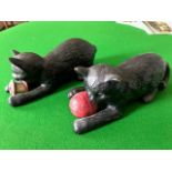 A pair of Bretby Art Pottery kittens, one playing with a ball of wool, the other with a reel, No.