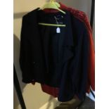 A red wool jacket with black embroidered decoration and a zipper down the front size 16; Daks for