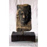 A Grand tour carved stone bust of a Napoleonic gentleman, raised on an oak plinth base. 40cm H