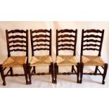 A set of twelve early 19th and later century elm rush seated chairs, circa 1810, ladder back with
