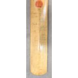 A signed cricket bat, England XI and Sir Frank Worrell's West Indian XI, dated 1964, some signatures