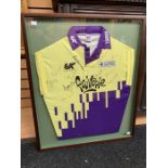 A framed and glazed, Aravinda de Silva, match worn shirt, worn for a charity match, signed by eleven