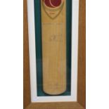 A signed cricket bat, comprising eighteen signatures from the 1985 Australian Cricket Team, most are