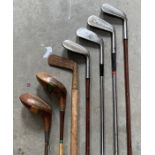 A collection of assorted golf clubs including Forsam, T. Smith, Willie Tomlinson, Dunlop and others,