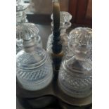 A 19th century decanter set housed in original treen holder, together with further 19th century