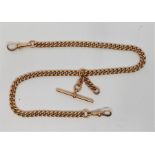 A 15ct. gold curb link double Albert chain, each link stamped "15" and ".625", length 39.5cm. (54.