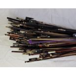 A collection of violin bows. (qty)