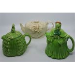 A collection of tea pots and covers, to include: A Sadler "Ye Daintee Ladyee", printed and impressed
