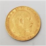 A 1908 Edward VII gold sovereign, London mint.