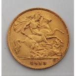 A 1913 George V gold half sovereign, London mint.