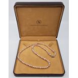 A Schoeffel cultured pearl necklace, formed a string of different colour pearls of diameter