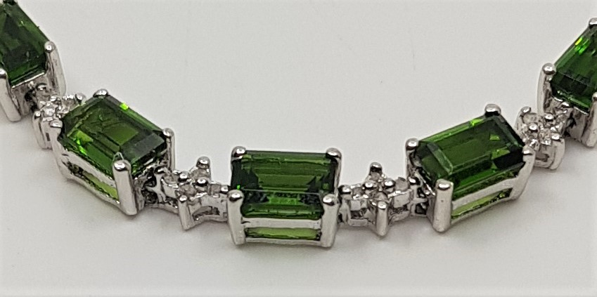 A sterling silver, diamond chip and green tourmaline set bracelet, length 19.5cm. - Image 2 of 2