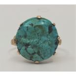 An antique 9ct. gold turquoise cameo ring, set circular cameo carved with a profile bust of a Coptic