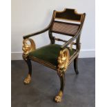 A Regency green-painted and parcel gilt armchair, after the design by George Smith