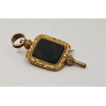 A 19th century gilt metal combined seal and pocket watch key fob, with plain blood stone matrix, (