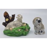 A Staffordshire model of a sheep, height 8.3cm, together with a Staffordshire salt glaze poodle,