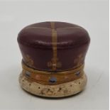 A late 19th century leather covered shaped travelling ink well, fashioned as a Royal crown, burgundy