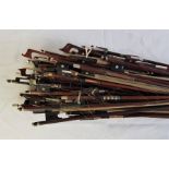 A collection of violin bows. (qty)