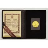 A 1979 Canada Elizabeth II $100 gold proof coin, with certificate in Royal Canadian Mint case.
