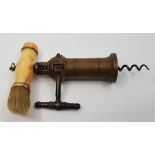 A Victorian Thomason type mechanical corkscrew, with turned bone handle and brush, and ratchet