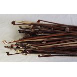 A collection of violin bows. (qty)