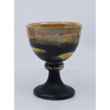 Margery Clinton (1931-2005), a studio pottery lustre glazed goblet, with knop stem, signed to