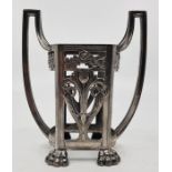 An Art Nouveau WMF twin handled pierced stand, stamped WMF Ostrich mark and pattern number 370A,