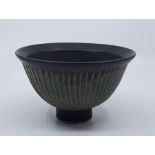A studio pottery pedestal bowl, with speckle glazed ribbed side, impressed seal to base, diameter