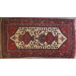 Two antique Kazak rugs, 202cm x 107cm and 165cm x 107cm. (2)