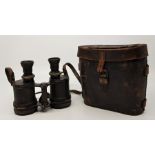 A pair of French military binoculars in leather case.